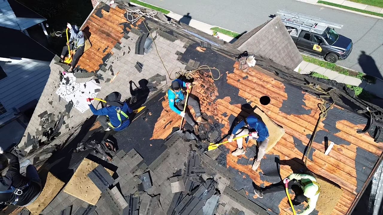 Photo documentation used to support a roof insurance claim after storm damage